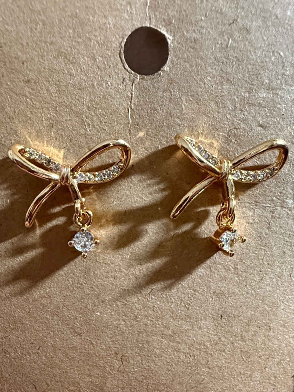 Gold Bow Drop Earrings with Clear Crystal Accent
